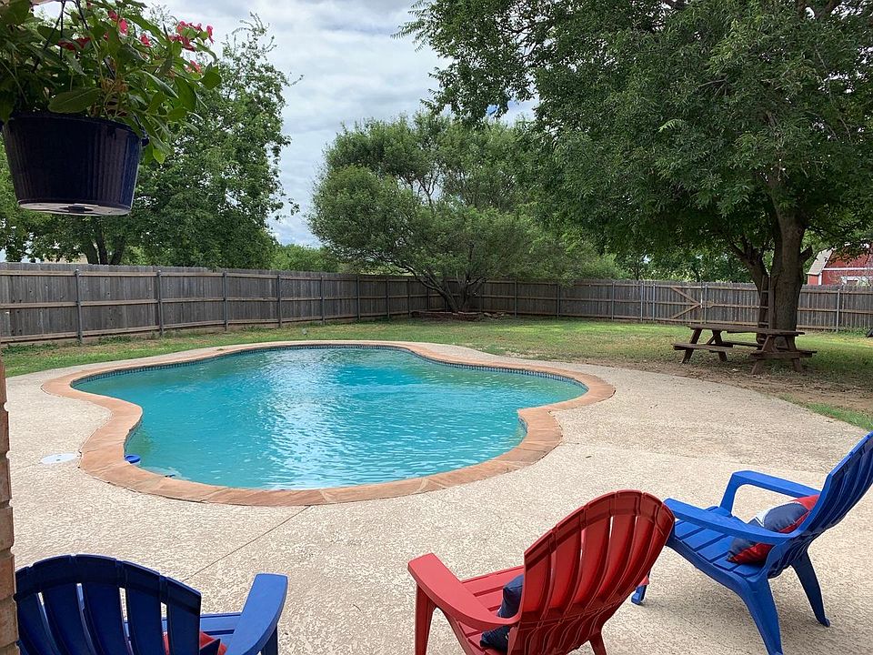 Crystal Clear in-ground pool with generous and private fenced yard