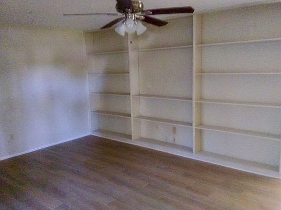 Family rm, shelves,fan,floor