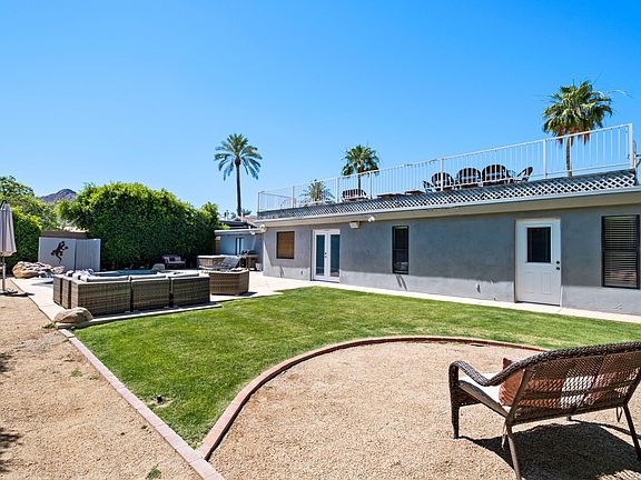 Bocce Ball court and grass area.