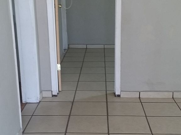 Living room, looking into bedroom