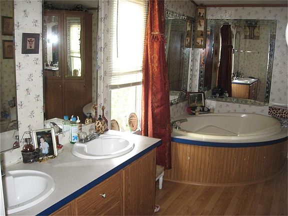 Double sink, garden tub and separate shower in Master bath