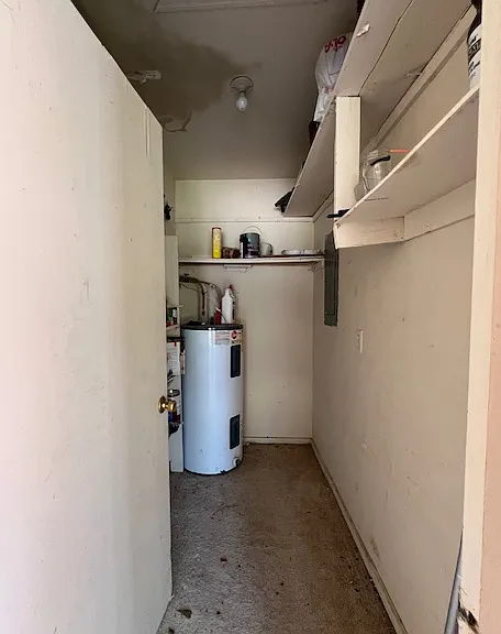 Storage room off of Carport