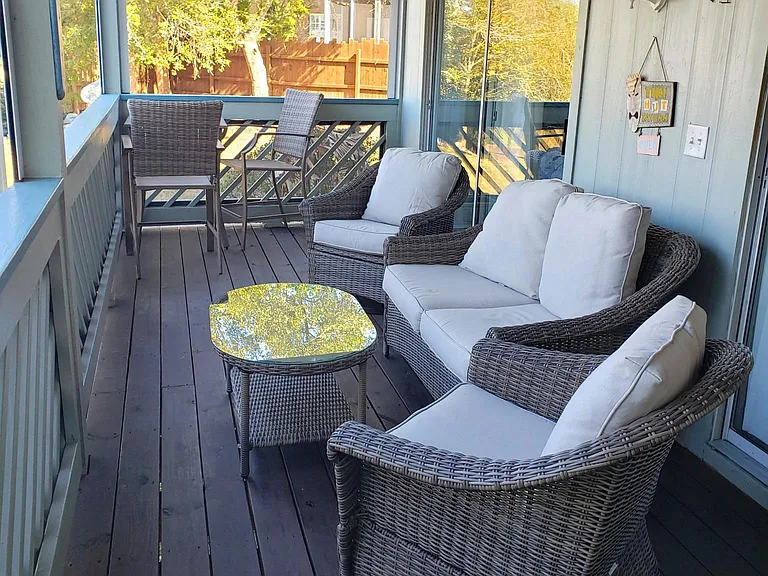 Comfortable Outdoor deck furniture
overlooking the marsh