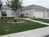 Frontage includes 3 car garage and HUGE RV.