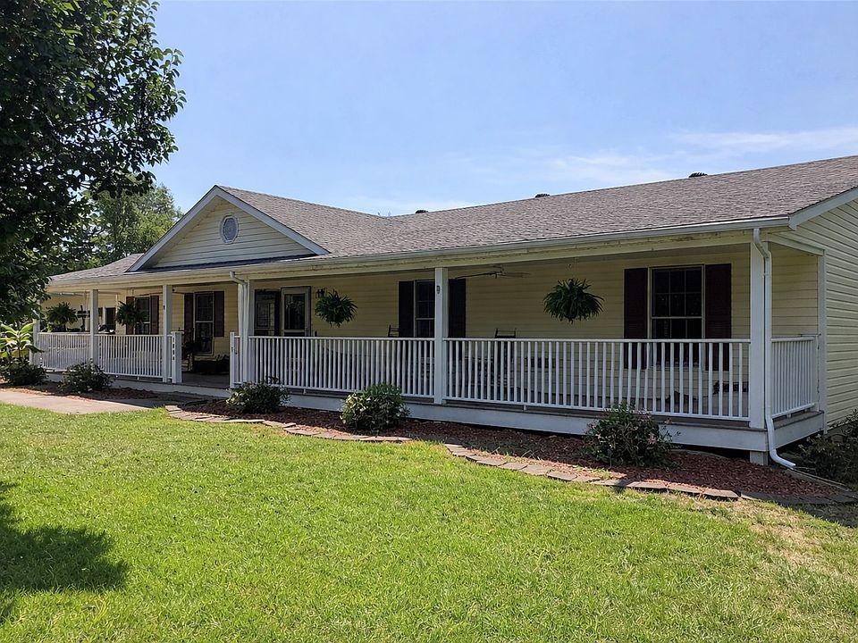 Front of the house with long covered porch