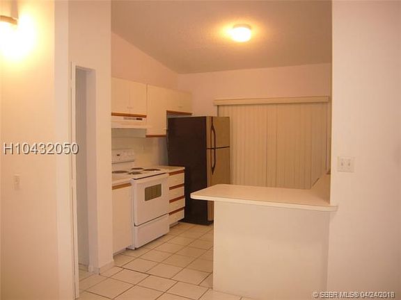 2nd image of 7080 NW 173rd Dr APT 1404