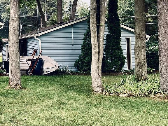 side yard and 2 1/2 car garage