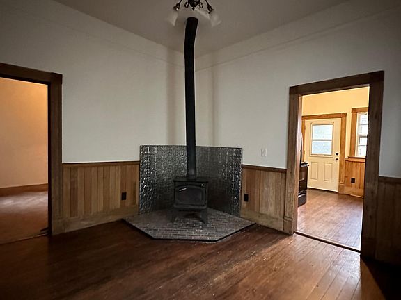 Dining room. Door on the left goes to bedroom #1. Door on the right goes to the kitchen.