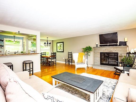 The seller has done an exquisite job opening up the kitchen to the living room...