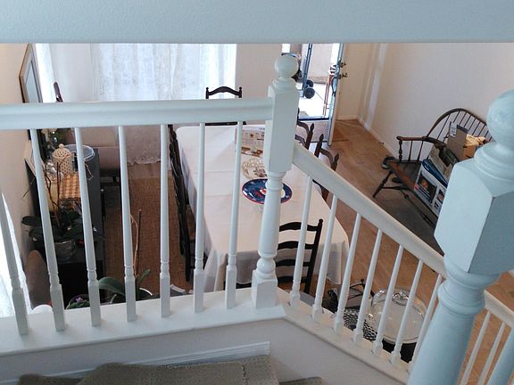 View from mid-stairs toward entry