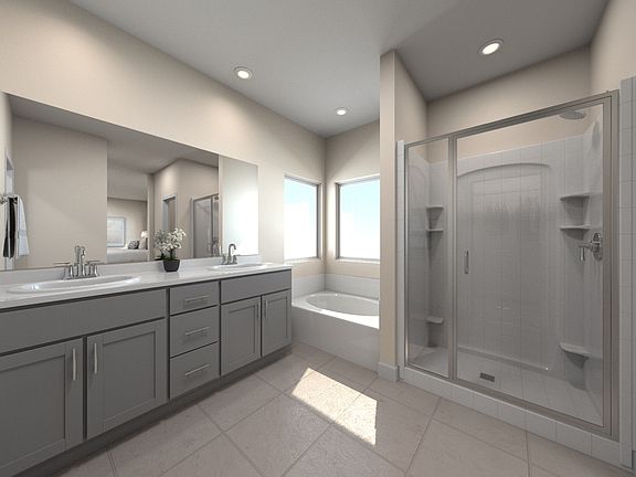 Residence 4 primary bathroom staged at a nearby Meritage community.