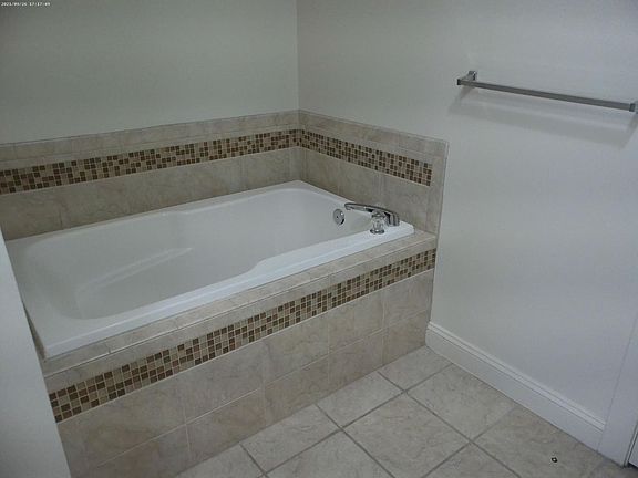 Owner's suite garden tub.