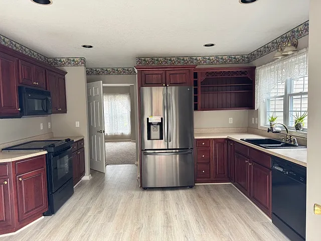 Kitchen from deck door area for breakfast table