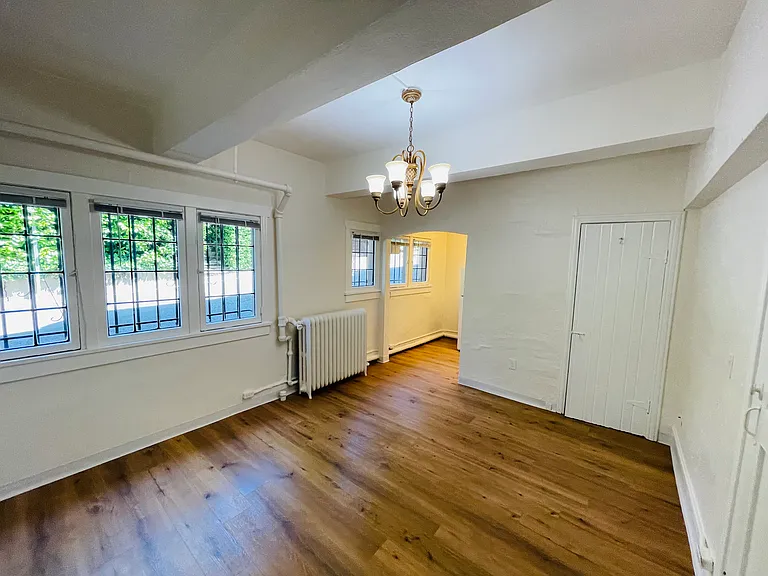 Large main room with wall of windows