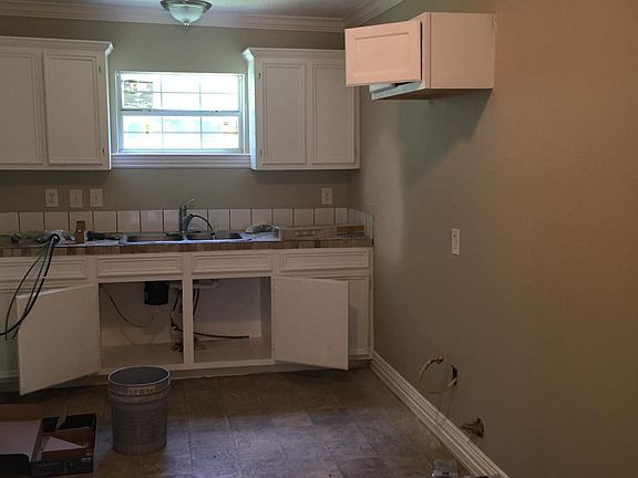 Kitchen will include electric stove and new floors