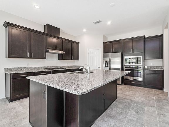 Oversized island with breakfast bar