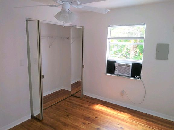 Second bedroom with roomy closet and new cooling unit. Room for a queen-size bed.
