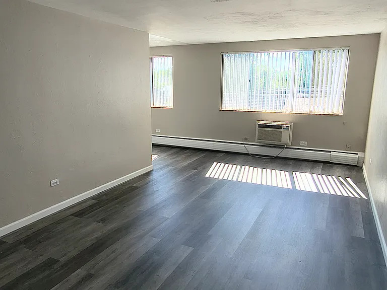 Looking into living room . Windows to have black out blinds