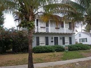 Northeast corner shows large gated side yard.