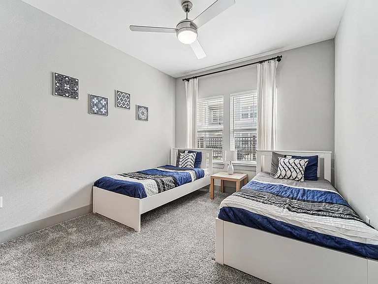 Relaxing bedroom retreat in The Broadway's modern apartment homes in Houston, Texas