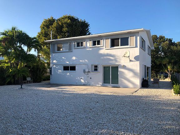 Back of home, fully fenced in yard.