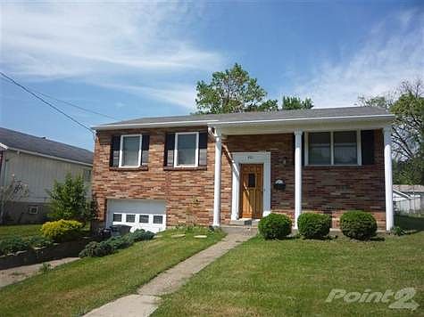 Attractive brick and siding home on a desirable fenced lot.