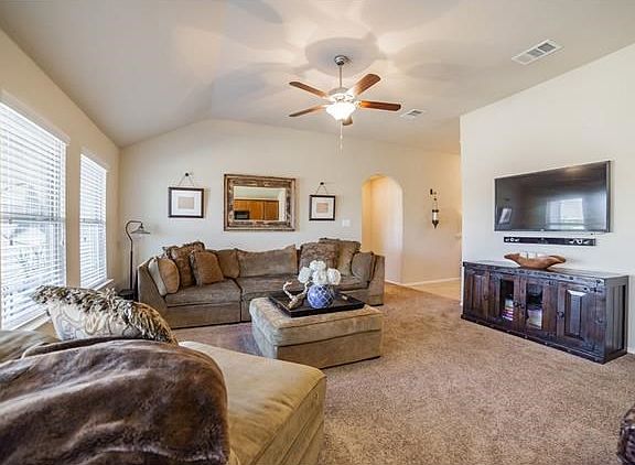 Beautiful open floor plan with cozy family room and huge windows