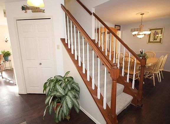 NEW distressed WOOD floors through out Family, Dining and Living Rooms!