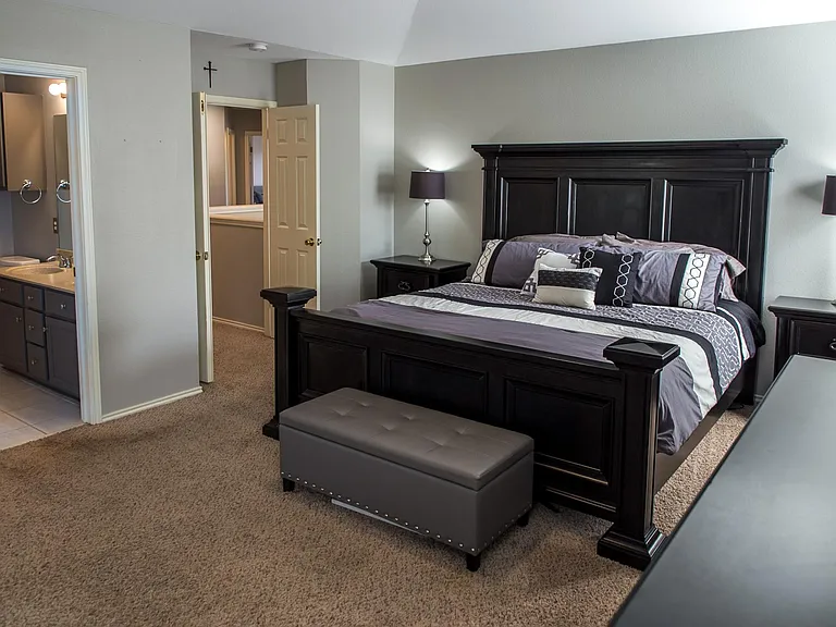 Generously Sized Primary Bedroom Featuring En-Suite Bathroom