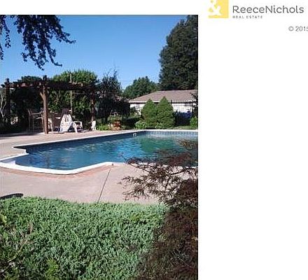 ENJOY YOUR SUMMERS IN THE BEAUTIFUL INGROUND POOL OR RELAXING POOLSIDE