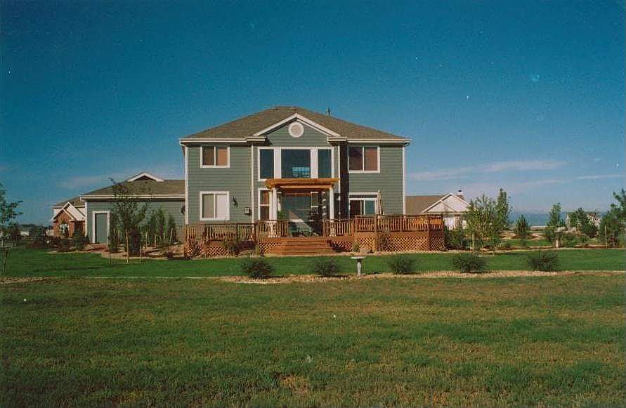 View to the West from the back lot line.