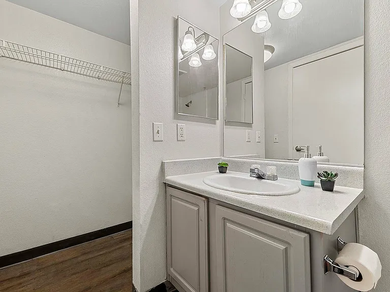 Experience elegance in every detail of this chic bathroom space.