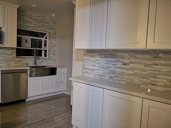 4th image of 8856 Lemona Ave