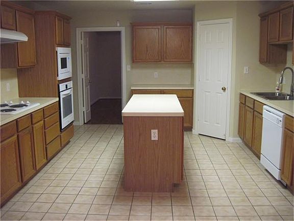 Kitchen with fresh paint and sparkling new appliances