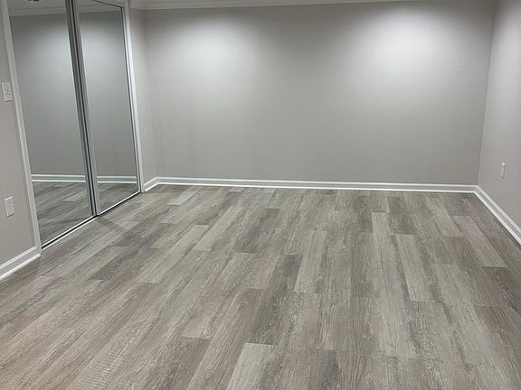 Large bedroom with a walking closet