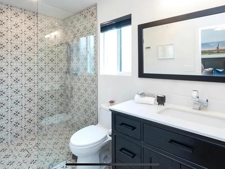 Master bathroom with seamless shower 
Designer faucets
