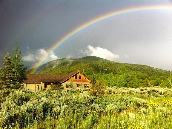 Your new house is surrounded by open space, incredible views and even has a trout stream in the back yard.