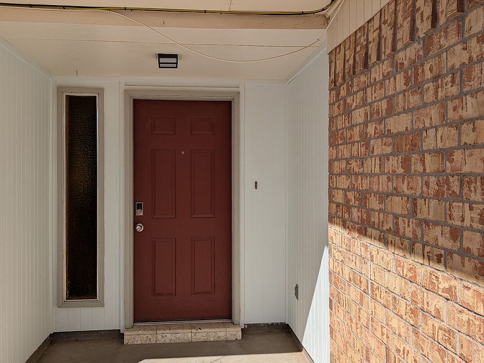 Front entrance with electronic keypad lock.