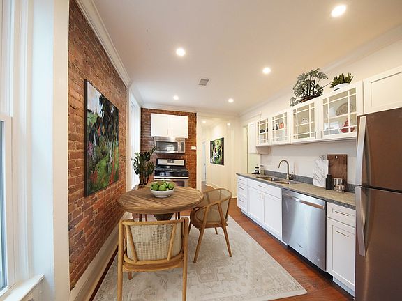 Second floor home, kitchen staged.