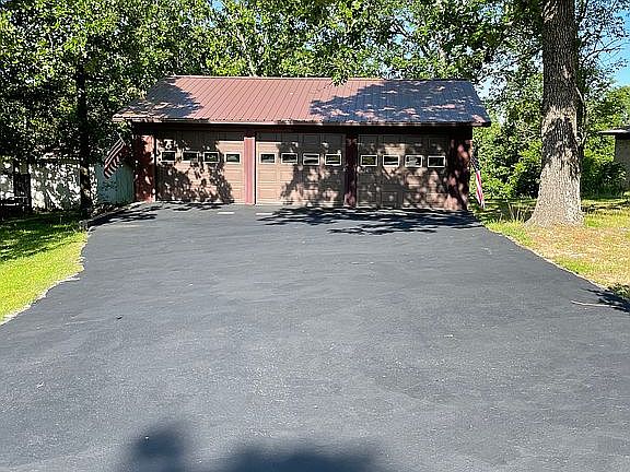 Recently sealed driveway.