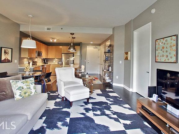 2nd image of 711 Cosmopolitan Dr NE Unit 313