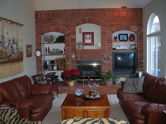Family Room with Fireplace and 2-Story Ceiling.