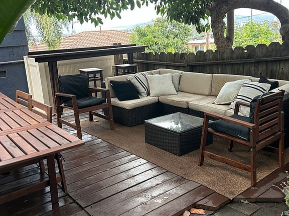 BAck deck area with partial view to the ocean and Sea World fireworks.