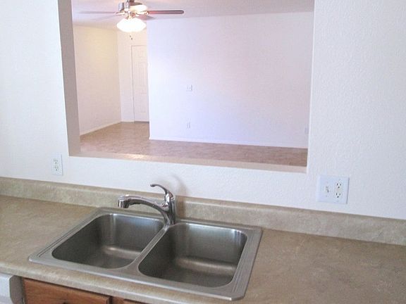 Kitchen Overlooks Living Rm