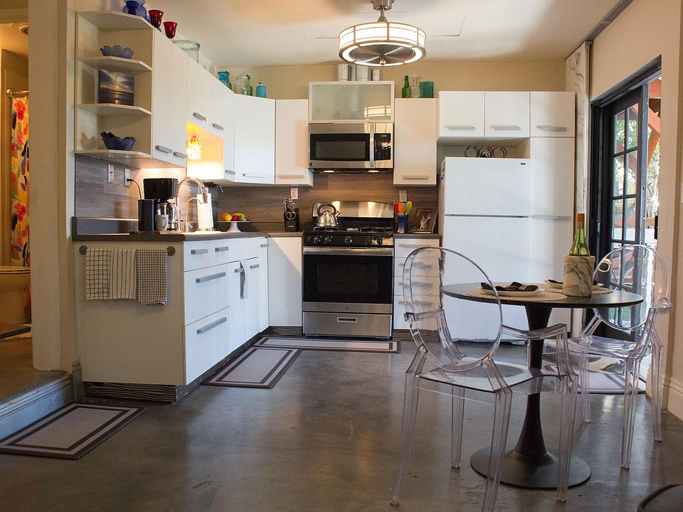 Finished concrete floors in kitchen, bedroom & bath are cool and smooth to the touch.