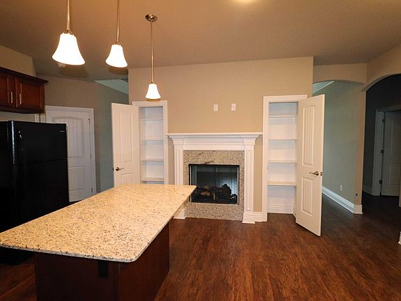 Fireplace and pantry in kitchen