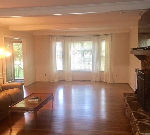Den with Hardwood Floors.