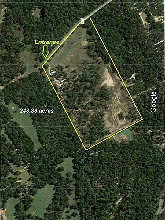 26.60 acres view with East at top and lake spillway site is midway near South line or as picture lays, to right.
