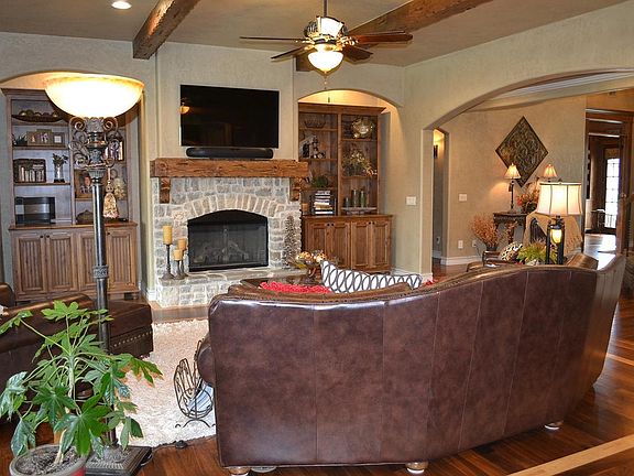 Custom built ins encasing fireplace