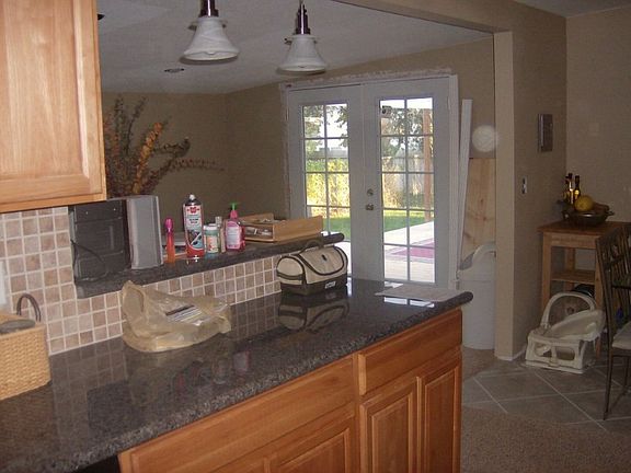 Ample RV parking, both inside and outside of cedar fencing shown here. Gate in cedar fence opens to large parking pad.